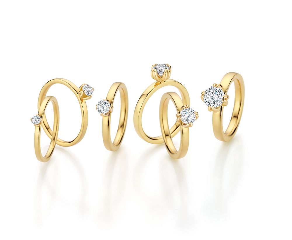 Trauringe in Gold mit Stein von Fischer